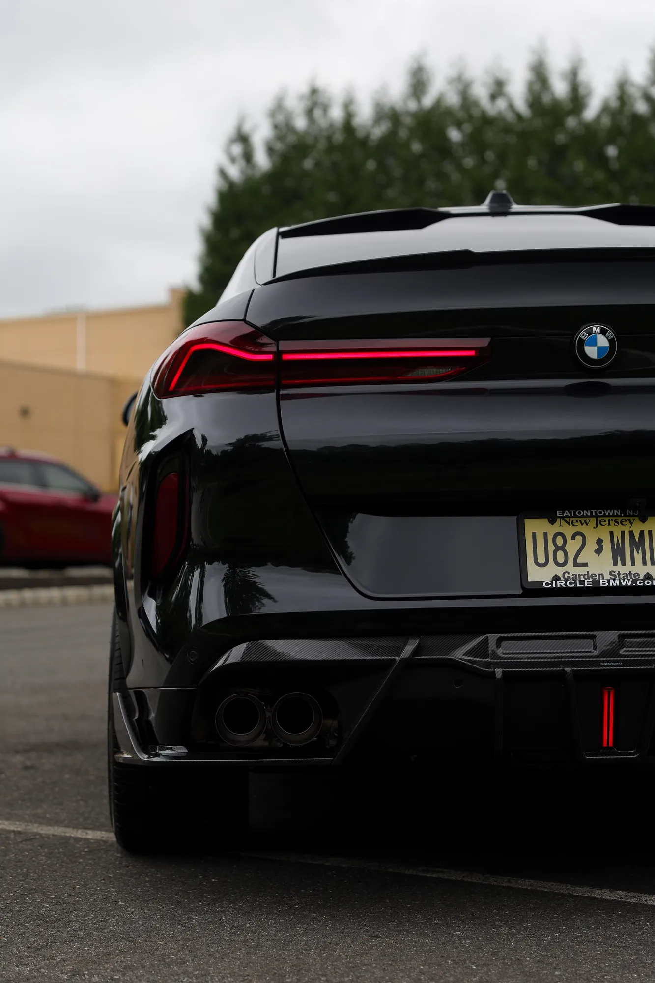 2025 BMW X6M Competition in Black Sapphire with full carbon fiber aero and Valvetronic exhaust by Lux Auto Studio, Marlboro NJ (photo 5)