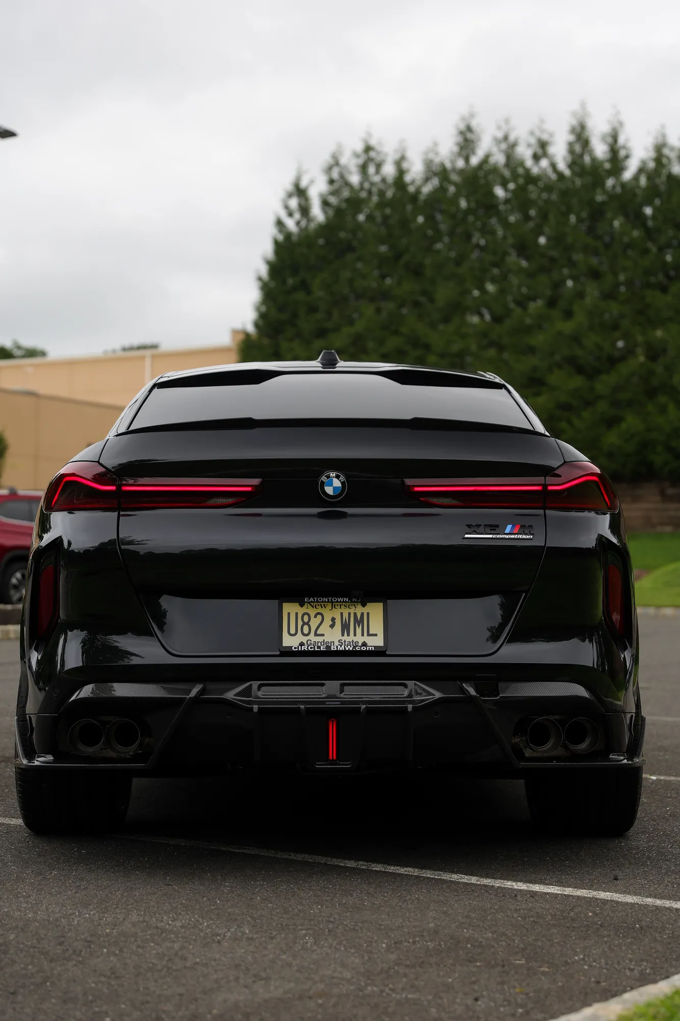 2025 BMW X6M Competition in Black Sapphire with full carbon fiber aero and Valvetronic exhaust by Lux Auto Studio, Marlboro NJ (photo 6)